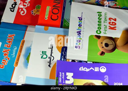 Cairo, Egypt, August 18 2023: Pile of Educational books used by Egyptian school children, learning, teaching, educational books concept either issued Stock Photo