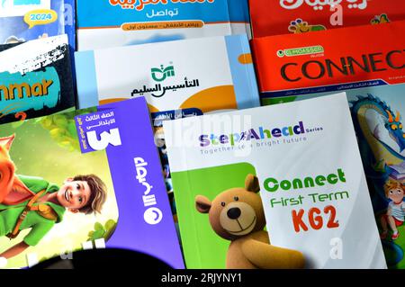 Cairo, Egypt, August 18 2023: Pile of Educational books used by Egyptian school children, learning, teaching, educational books concept either issued Stock Photo