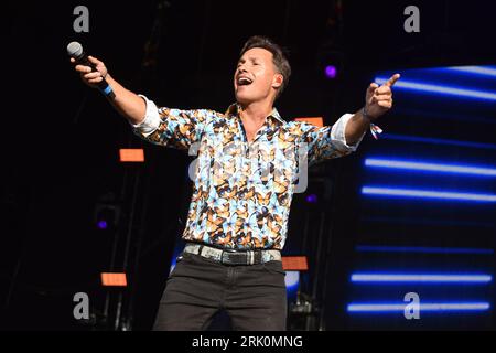 Henley On Thames, UK. 20th Aug, 2023. Nathan Moore of Brother Beyond performs on stage during the Rewind Festival South 2023, at Temple Island Meadows. (Photo by James Warren/SOPA Images/Sipa USA) Credit: Sipa USA/Alamy Live News Stock Photo