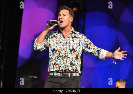 Henley On Thames, UK. 20th Aug, 2023. Nathan Moore of Brother Beyond performs on stage during the Rewind Festival South 2023, at Temple Island Meadows. Credit: SOPA Images Limited/Alamy Live News Stock Photo