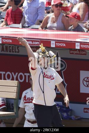 Los Angeles Angels' Shohei Ohtani, right, talks with interpreter Ippei  Mizuhara during the first inning of a baseball game against the Seattle  Mariners Friday, Sept. 16, 2022, in Anaheim, Calif. (AP Photo/Mark