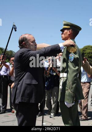 Algeria President Abdelaziz Bouteflika, left, speaks with his Egyptian ...