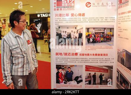 Hong Kong singer Alan Tam poses as he arrives for an anniversary 