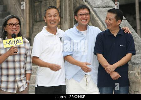 Bildnummer: 53227527  Datum: 28.07.2009  Copyright: imago/Xinhua (090728) -- SHANGHAI, July 28, 2009 (Xinhua) -- Hong Kong director Wai Keung Lau (R2) of the Chinese movie  Bodyguards and Assassins  attends the closing ceremony in Shengqiang Film & TV Base in Shanghai, China, July 27, 2009. The Chinese movie  Bodyguards and Assassins  has wrapped up and will debut in December.         (Xinhua/Zhu Liangcheng)  (ly) (2)CHINA-SHANGHAI-BODYGUARDS AND ASSASSINS (CN)  PUBLICATIONxNOTxINxCHN  People Film  kbdig xkg  2009 quer Highlight    Image number 53227527 Date 28 07 2009 Copyright Imago XINHUA 0 Stock Photo