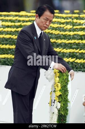 Bildnummer: 53246247  Datum: 06.08.2009  Copyright: imago/Xinhua (090806) -- HIROSHIMA, Aug. 6, 2009 (Xinhua) -- Japanese Prime Minister Taro Aso lays a wreath at Memorial Cenotaph during the Hiroshima Peace Memorial Ceremony in Hiroshima, western Japan on Aug. 6, 2009. Hiroshima on Thursday mourned the 64th anniversary of the atomic bombing of the city by U.S. forces during the World War II. (Xinhua/Ren Zhenglai)(zx) (1)JAPAN-HIROSHIMA-ATOMIC BOMBING-ANNIVERSARY  PUBLICATIONxNOTxINxCHN  People Politik Jahrestag Gedenken Abwurf Atombombe Hiroshima 2 Weltkrieg kbdig xdp  2009 hoch     Bildnumme Stock Photo