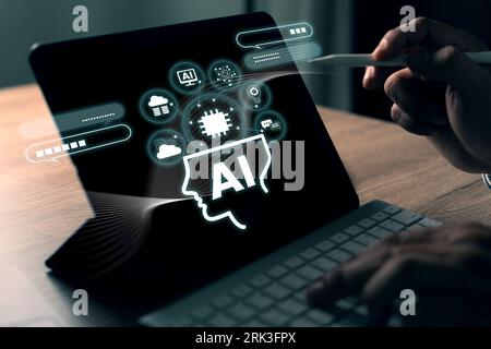 Man uses AI, machine learning, and artificial intelligence technology. chat on computer digital assistant big data concept Chat with AI Stock Photo