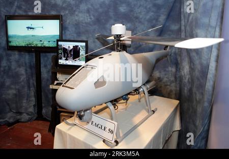 Bildnummer: 53530804  Datum: 14.10.2009  Copyright: imago/Xinhua (091015)-- TEL AVIV, Oct. 15, 2009 (Xinhua) -- Black Eagle unmanned helicopter robotic observation system for military and civilian missions is displayed at the Israel Defense Exhibition in Tel Aviv Wednesday October 14, 2009. This unmanned helicopter developed by Steadicopter , an Israeli 3D aerial robotics company, has a range of 150 kms. Many new products for the military, police and security markets were shown at the exhibition. (Xinhua) (1)ISRAEL-TEL AVIV-DEFENCE EXHIBITION PUBLICATIONxNOTxINxCHN Militär Ausstellung kbdig xc Stock Photo