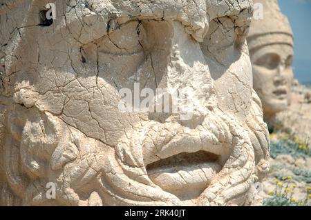 Giant God heads on Mount Nemrut. Anatolia, Turkey. Ancient colossal stone statues representing legendary mythological figures Stock Photo