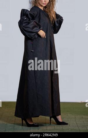 Arab women in traditional Designer Abaya Dress. Fashion Concept Stock Photo