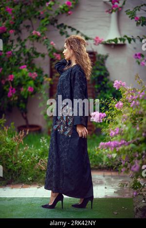 Arab women in traditional Designer Abaya Dress. Fashion Concept Stock Photo