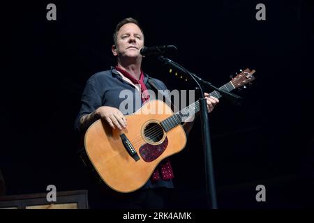 Kiefer Sutherland live on stage at The 2023 Cambridge Folk Festival. Stock Photo