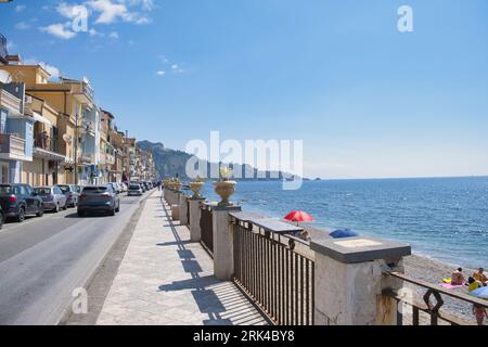 Street, promenade in the place called Giardini Naxos which is near Taormina in Sicily, Italy Stock Photo