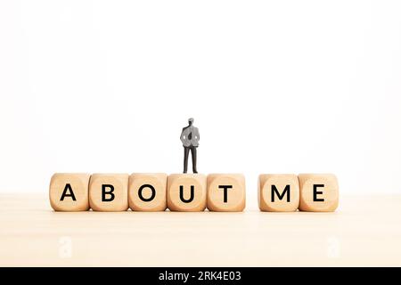 About Me phrase on wooden blocks. Copy space Stock Photo
