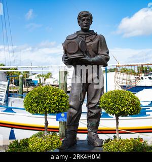 A bronze diver statue on the sponge fishing docks in Tarpon Springs Stock Photo