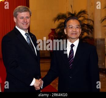 Bildnummer: 53642620  Datum: 03.12.2009  Copyright: imago/Xinhua (091203) -- BEIJING, Dec. 3, 2009 (Xinhua) -- Chinese Premier Wen Jiabao (R) shakes hands with visiting Canadian Prime Minister Stephen Harper in Beijing, capital of China, Dec. 3, 2009. (Xinhua/Yao Dawei) (ypf) (2)CHINA-BEIJING-CANADA-WEN JIABAO-HARPER (CN) PUBLICATIONxNOTxINxCHN People Politik kbdig xmk 2009 quadrat premiumd    Bildnummer 53642620 Date 03 12 2009 Copyright Imago XINHUA  Beijing DEC 3 2009 XINHUA Chinese Premier Wen Jiabao r Shakes Hands With Visiting Canadian Prime Ministers Stephen Harper in Beijing Capital of Stock Photo