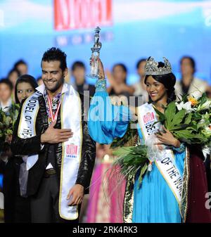 Bildnummer: 53662148  Datum: 12.12.2009  Copyright: imago/Xinhua (091212) -- SOFIA, Dec. 12, 2009 (Xinhua) -- Erkan Meric from Turkey and Aicha Dicko from Mali, champions of the contest, pose for photos in the final of the best model of the world contest in Sofia, Bulgaria, Dec. 12, 2009. Erkan Meric from Turkey and Aicha Dicko from Mali won the men s and women s champions respectively. One hundred and twenty contestants took part in the competition. (Xinhua/Yang Zongyou) (zhs) (5)BULGARIA-SOFIA-MODEL CONTEST-CLOSING PUBLICATIONxNOTxINxCHN Sofia Model Models Modelwettbewerb Wettbewerb kbdig xu Stock Photo