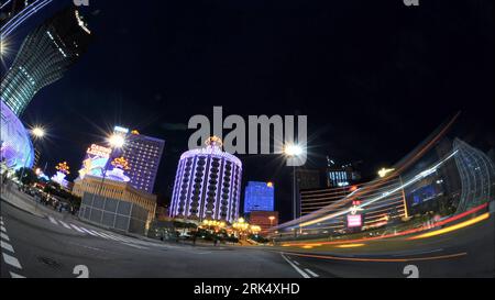 Bildnummer: 53677291  Datum: 18.12.2009  Copyright: imago/Xinhua (091218) -- BEIJING, Dec. 18, 2009 (Xinhua) -- Photo taken in November 2009 shows the night view in Macao Special Administrative Region (SAR) in south China. The 10th anniversary of Macao s return to the motherland will fall on Dec. 20 this year. (Xinhua) (zl) (5)CHINA-MACAO SAR-ANNIVERSARY PUBLICATIONxNOTxINxCHN Asien China Macao kbdig xcb 2009 quer o0 Restlichtaufnahme Bewegungsunschärfe Abends Nachts Lichter Straße o0 fisheye    Bildnummer 53677291 Date 18 12 2009 Copyright Imago XINHUA  Beijing DEC 18 2009 XINHUA Photo Taken Stock Photo