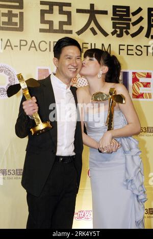 Bildnummer: 53679468  Datum: 19.12.2009  Copyright: imago/Xinhua (091220) -- KAOSIUNG, Dec. 20, 2009 (Xinhua) -- Best Actress Sandrine Pinna(R) of Taiwan Province of southeast China and and Best Actor Chinese Hong Kong actor Nick Cheung Ka Faithe pose with their trophies in the awarding ceremony of the 53rd Asia Pacific Film Festival awards in I-Sho University in Kaoshiung of southeast China s Taiwan Province on Dec. 19, 2009. The 53rd Asia Pacific Film Festival attracted 58 films from 14 nations and regions who are members of this regional film festival. Some 500 delegates took part in the aw Stock Photo
