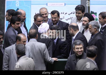 Bildnummer: 53748234  Datum: 24.01.2010  Copyright: imago/Xinhua (100124) -- TEHRAN, Jan. 24, 2010 (Xinhua) -- Iranian President Mahmoud Ahmadinejad (C) greets lawmakers in the Majlis (Parliament) in Tehran, Iran, Jan. 24, 2010. Ahmadinejad presented the bill for next year s budget to the Majlis and said Sunday that Iran will announce good news regarding the 20-percent enriched nuclear fuel needed for a medical research reactor. (Xinhua/Ahmad Halabisaz) (hdt) (8)IRAN-MAJLIS-BUDGET PUBLICATIONxNOTxINxCHN People Politik Kbdig xdp 2010 quer     Bildnummer 53748234 Date 24 01 2010 Copyright Imago Stock Photo