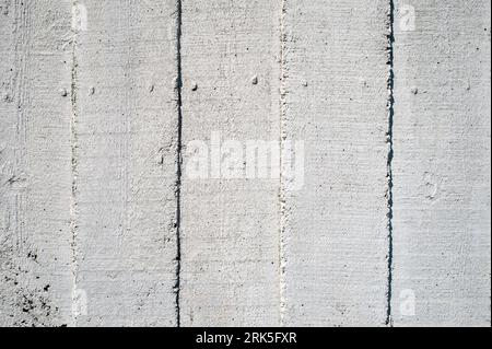 Wood textured concrete wall painted white. Stock Photo