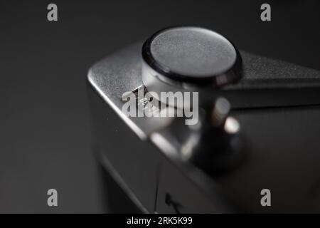 A close-up of a film counter of a camera with a small dial Stock Photo