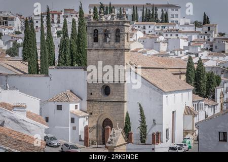 Views of the medieval village of Ronda with white Andalusian houses and the gothic style church of Nuestro Padre Jesus. Malaga, Spain Stock Photo