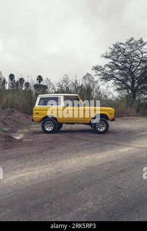 Monterrey, Mexico - February 27, 2023 old Ford Bronco 71 posing on a path. Stock Photo