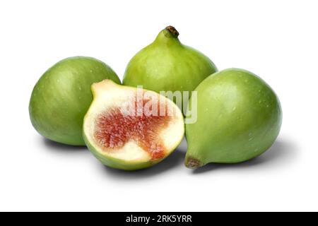 Heap of fresh whole and halved green figs isolated on white background close up Stock Photo