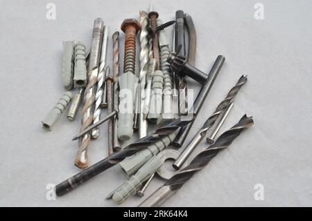 Close-up of drill bits with screws ready for work, representing efficiency in construction. Set of close-up drills, perfect for representing precise w Stock Photo