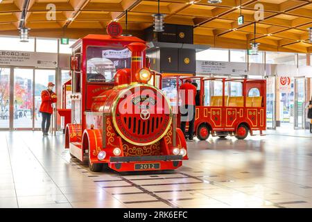 Oita, Japan - Nov 26 2022:The famous Japanese toy train, Bun Bun Go, operated inside the central hall at Oita station Stock Photo