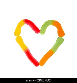 Isolated gummy worms in the shape of heart. Love jelly sweet food concept Stock Photo