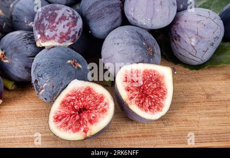 purple figs in front of white background Stock Photo