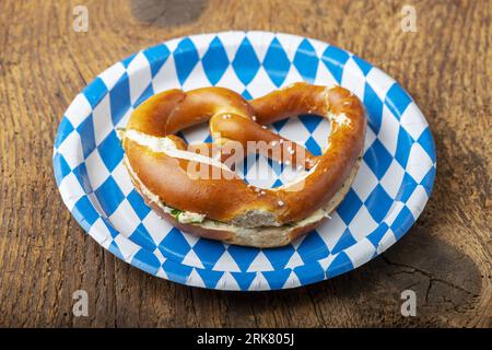 Bavarian Pretzel On White And Blue Plate Stock Photo