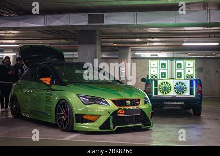 Front view of a third-generation green Seat Leon at a tuning car rally Stock Photo