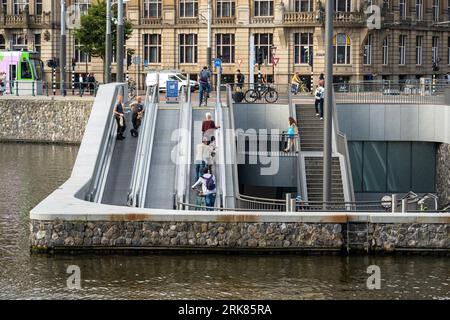 Amsterdam, The Netherlands, 24.08.2023, Entrance to new, underwater bike parking at the central station, largest bicycle parking facility in Amsterdam Stock Photo