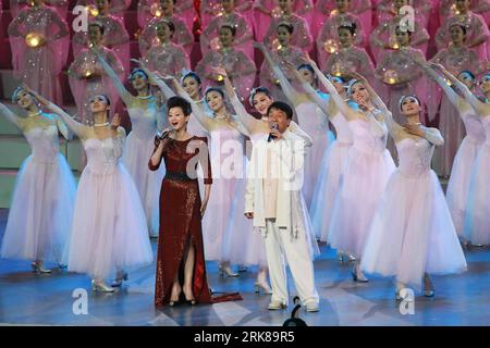 Bildnummer: 54000199  Datum: 30.04.2010  Copyright: imago/Xinhua (100430) -- SHANGHAI, April 30, 2010 (Xinhua) -- Chinese singer Song Zuying (Front L) and Hong Kong actor Jackie Chan (Front R) sing during the opening ceremony of the 2010 Shanghai World Expo at the Expo Cultural Center in Shanghai, east China, April 30, 2010. (Xinhua/Ren Long) (kh) WORLD EXPO-OPENING CEREMONY-PERFORMANCE (CN) PUBLICATIONxNOTxINxCHN Wirtschaft Gesellschaft Expo Shanghai Eröffnung Eröffnungsfeier People Aktion kbdig xng 2010 quer Highlight premiumd xint o0 Musik    Bildnummer 54000199 Date 30 04 2010 Copyright Im Stock Photo