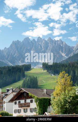 Scenic view of Innichen (San Candido) with ski slope and Haunold (Rocca dei Batanci) in background in summer Stock Photo