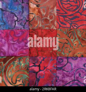 Sewn square bright pieces of batik, part of quilt, traditional patchwork Stock Photo