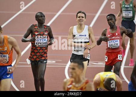 Budapest, Hungary. 24th Aug, 2023. Belgian John Heymans (C) pictured after the heats of the men's 5000m race at the World Athletics Championships in Budapest, Hungary on Thursday 24 August 2023. The Worlds are taking place from 19 to 27 August 2023. BELGA PHOTO ERIC LALMAND Credit: Belga News Agency/Alamy Live News Stock Photo