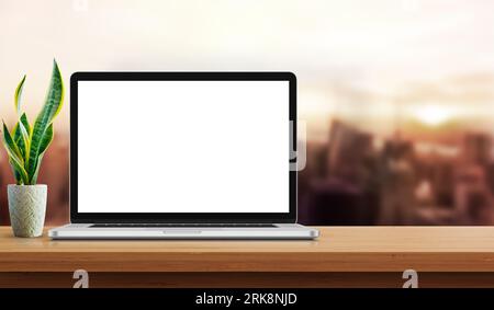Laptop on wooden desk with background. Laptop or Computer mockup white background on table Stock Photo