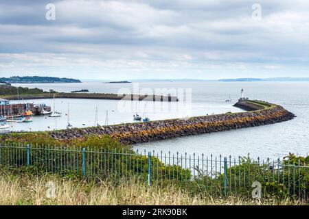 Lighthouse and breakwater at entrance to Barry harbour and docks, Barry, South Wales, UK Stock Photo