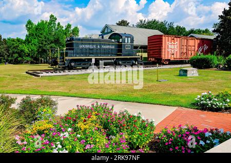 A 1941 diesel locomotive train sits outside the historic Foley Train Depot, which now houses the Foley Railroad Museum in Foley, Alabama. Stock Photo