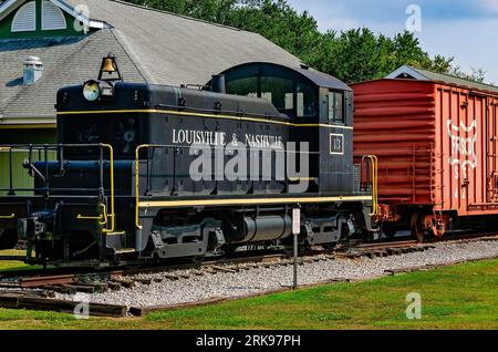 A 1941 diesel locomotive train sits outside the historic Foley Train Depot, which now houses the Foley Railroad Museum in Foley, Alabama. Stock Photo