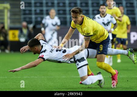 Lugano, Switzerland. 29th Nov, 2020. Cristopher Lungoyi (#8 FC Lugano) and  Albian Hajdari (#76 FC Basel 1893) in action during the Swiss Super League  match between FC Lugano and FC Basel 1893