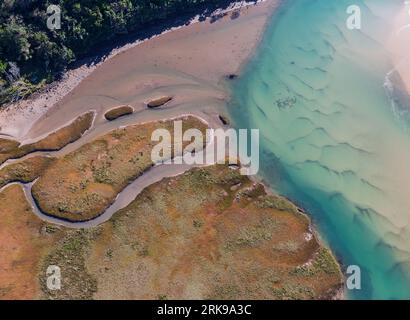 Abstract aerial photograph of Gonubie River mouth and estuary. Stock Photo