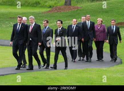 Bildnummer: 54176762  Datum: 25.06.2010  Copyright: imago/Xinhua (100625) -- HUNTSVILLE, June 25, 2010 (Xinhua) -- Canadian Prime Minister Stephen Harper (front R) is flanked by G-8 leaders as they stroll down a path on their way to pose for the leaders group photo at the G-8 Summit in Huntsville, Ontario, on June 25, 2010. From the left are: British Prime Minister David Cameron, European Council President Herman Van Rompuy, Russian President Dmitry Medvedev, Prime Minister of Japan Naoto Kan, Italian President Silvio Berlusconi, European Commission President Jose Manuel Barroso, U.S. Presiden Stock Photo