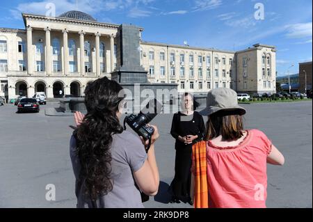 Bildnummer: 54176770  Datum: 25.06.2010  Copyright: imago/Xinhua (100626) -- GORI, June 26, 2010 (Xinhua) -- A woman receives interview at the square where the statue of late Soviet leader Joseph Stalin has been dismantled on June 25, 2010. The Georgian authorities removed the statue of Joseph Stalin from the central square of his hometown Gori in Georgia in an unannounced midnight move early June 25, 2010. (Xinhua/Wang Siwei) (lyx) (4)GEORGIA-GORI-STALIN-STATUE PUBLICATIONxNOTxINxCHN People Politik UdSSR SU Statue Denkmal premiumd xint kbdig xmk 2010 quer  o0 Demontage    Bildnummer 54176770 Stock Photo