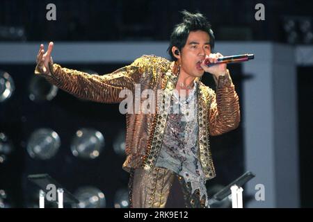 Bildnummer: 54179206  Datum: 25.06.2010  Copyright: imago/Xinhua (100626) -- SHANGHAI, June 26, 2010 (Xinhua) -- Taiwanese pop singer Jay Chou performs during the Shanghai stage of The Era 2010 world tour held at the Shanghai Stadium in east China s Shanghai Municipality, June 25, 2010. (Xinhua/Zhu Liangcheng)(mcg) (CN) PUBLICATIONxNOTxINxCHN Kultur People Musik Aktion kbdig xng 2010 quer    Bildnummer 54179206 Date 25 06 2010 Copyright Imago XINHUA  Shanghai June 26 2010 XINHUA Taiwanese Pop Singer Jay Chou performs during The Shanghai Stage of The ERA 2010 World Tour Hero AT The Shanghai Sta Stock Photo