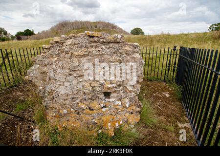 The only remaining block of masonry sitting on the site of Fotheringhay Castle which was dismantled in 1628. The historic castle was part of two major moments in English history. King Richard III was born at Fotheringhay in October 1452. Mary Queen of Scots was held prisoner and executed at Fotheringhay in February 1587. The remaining stones sit beside the River Nene in the County of Northamptonshire. Stock Photo