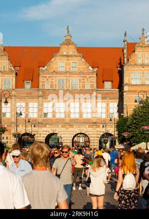 Crowd of tourists at the Green Gate or Brama Zielona in the Old Town of Gdansk, Poland Stock Photo